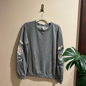 Seen worn kept Crewneck sweatshirt sz 8. With floral embroidered sleeves